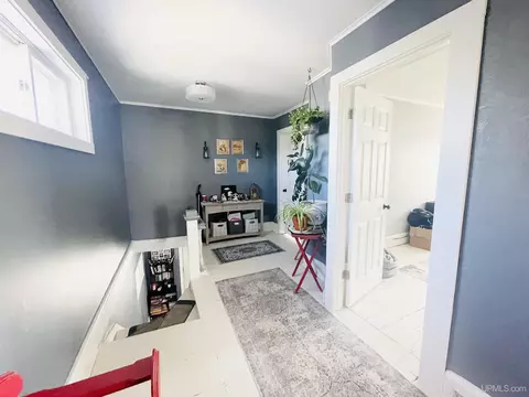 Entry Way - 210 S 8th, Escanaba, MI 49829 photo 1 of 2