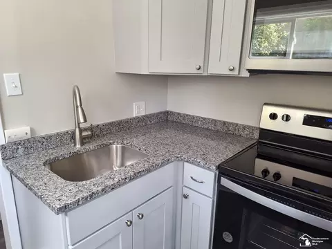 Kitchen - 611 W Maumee, Adrian, MI 49221 photo 2 of 3