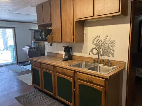 Kitchen - 115 S Elm, Gladwin, MI 48624 photo 2 of 3
