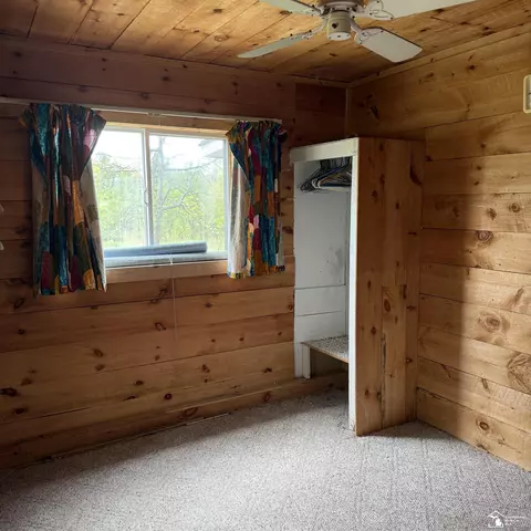 Bedroom - 546 N M-30, Gladwin, MI 48624 photo 6 of 7
