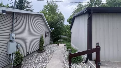 Exterior - 6439 E Redman, Harrison, MI 48625 photo 8 of 15