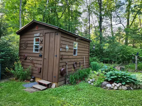 Exterior - 7766 Alpine, Harrison, MI 48625 photo 4 of 11