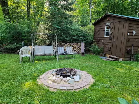 Exterior - 7766 Alpine, Harrison, MI 48625 photo 3 of 11