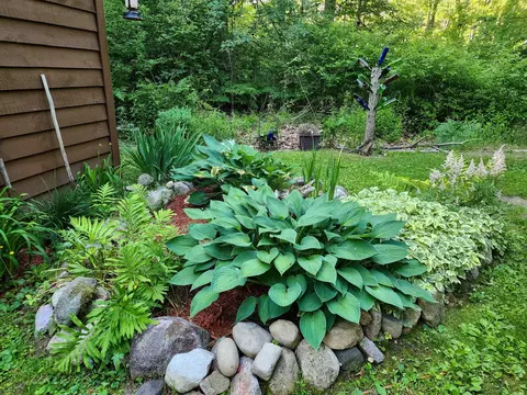 Exterior - 7766 Alpine, Harrison, MI 48625 photo 5 of 11