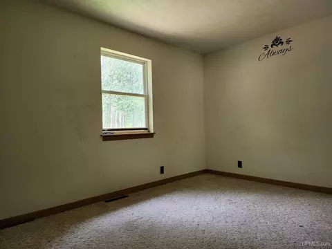 Bedroom - 8982 Us 2, Rapid River, MI 49878 photo 2 of 2
