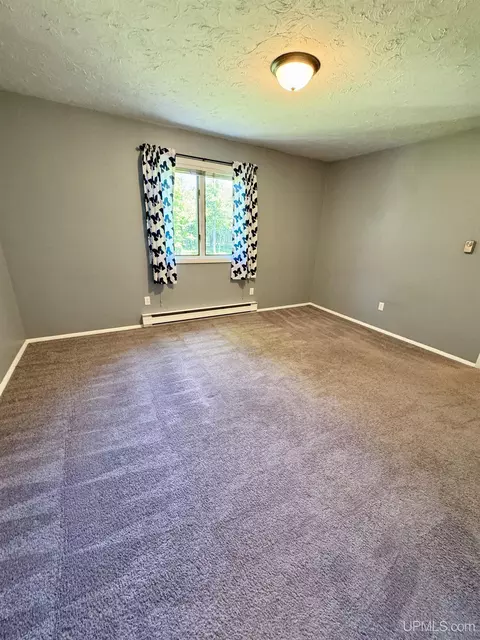 Bedroom - 4905 Co Rd Pi, Ishpeming, MI 49849 photo 1 of 4