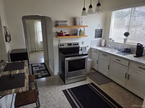 Kitchen - 1115 S 13th, Escanaba, MI 49829 photo 1 of 2