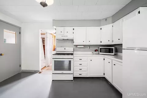 Kitchen - 8025 15th, Rapid River, MI 49878 photo 2 of 3