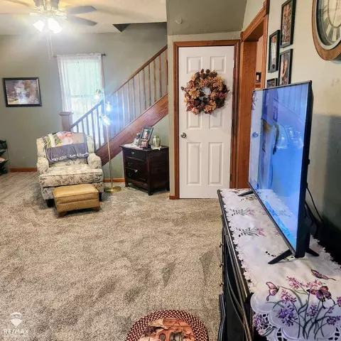 Living - 205 W Maple, Shepherd, MI 48883 photo 1 of 2