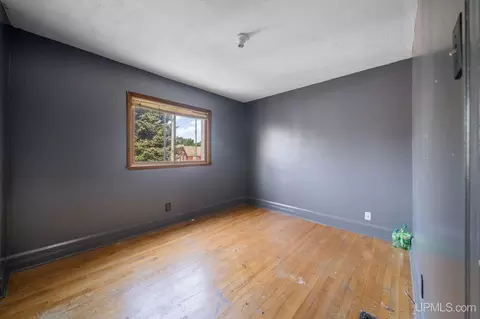 Bedroom - 635 N Fifth, Ishpeming, MI 49849 photo 1 of 11