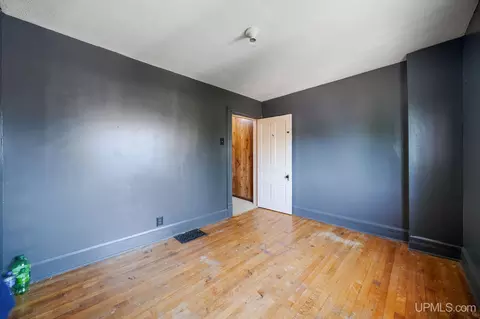 Bedroom - 635 N Fifth, Ishpeming, MI 49849 photo 2 of 11
