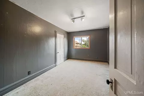 Bedroom - 635 N Fifth, Ishpeming, MI 49849 photo 3 of 11