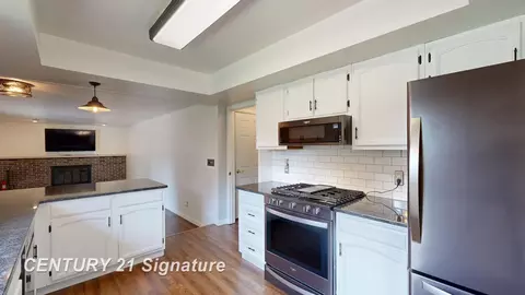 Kitchen - 8547 Tim Tam, Flushing, MI 48433 photo 2 of 4