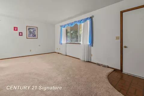 Living - 2889 W Birch Run, Burt, MI 48417 photo 5 of 7