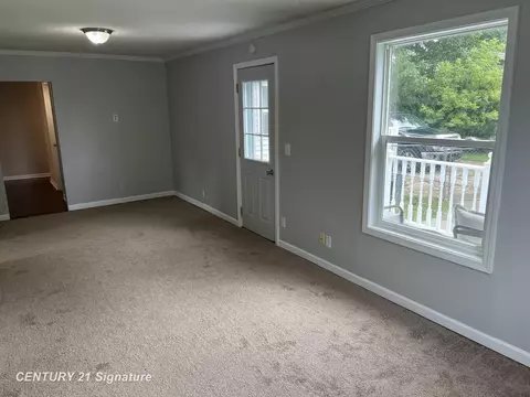 Living - 1104 E Hurd, Clio, MI 48420 photo 2 of 3