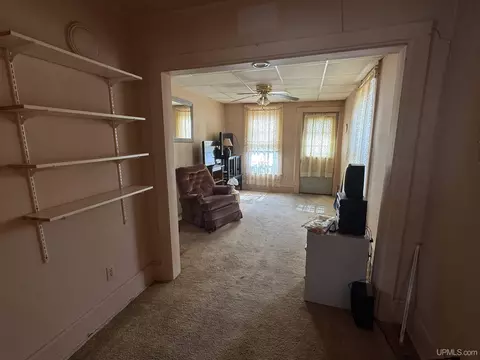 Living - 910 S 3rd, Escanaba, MI 49829 photo 1 of 3
