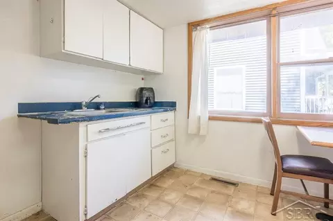 Kitchen - 703 Maple, Clare, MI 48617 photo 2 of 2