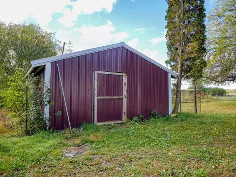 Exterior - 8706 Cork, Greenwood, MI 48006 photo 6 of 7