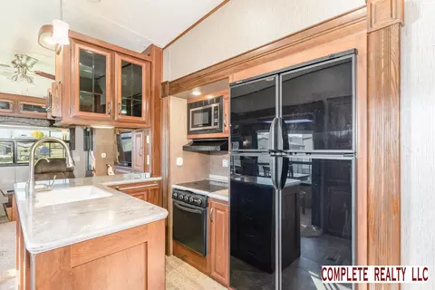 Kitchen - 831 Main St UNIT 222, Au Gres, MI 48703 photo 2 of 5