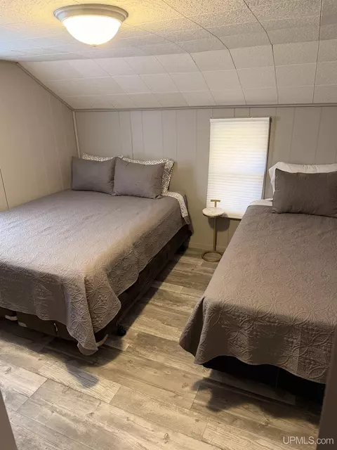 Bedroom - e9399 Michigan 28, Munising, MI 49862 photo 3 of 8