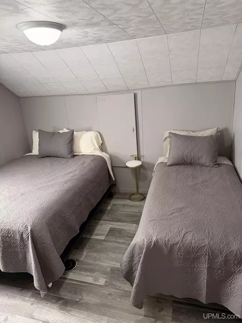 Bedroom - e9399 Michigan 28, Munising, MI 49862 photo 7 of 8