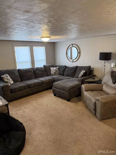 Living - e9399 Michigan 28, Munising, MI 49862 photo 1 of 2