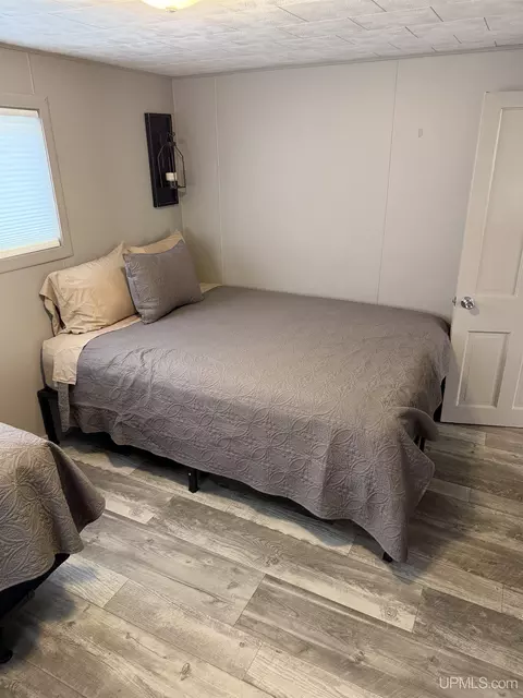 Bedroom - e9399 Michigan 28, Munising, MI 49862 photo 2 of 8