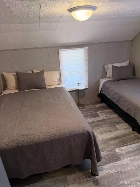 Bedroom - e9399 Michigan 28, Munising, MI 49862 photo 5 of 8