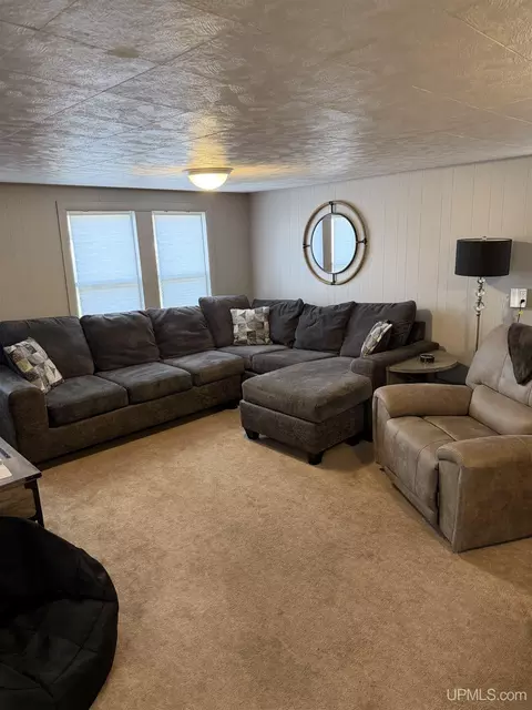 Living - e9399 Michigan 28, Munising, MI 49862 photo 1 of 2