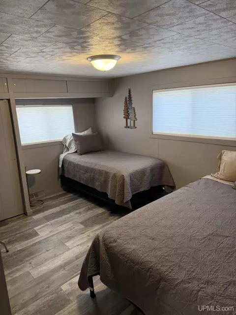 Bedroom - e9399 Michigan 28, Munising, MI 49862 photo 1 of 8