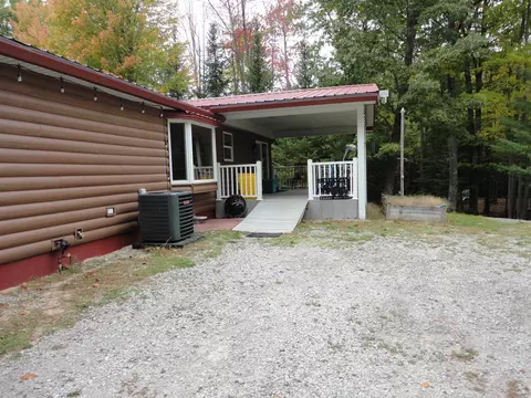 Exterior - 3200 Cedar Shores Dr, Harrison, MI 48625 photo 24 of 25