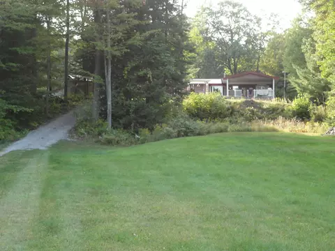 Exterior - 3200 Cedar Shores Dr, Harrison, MI 48625 photo 10 of 25