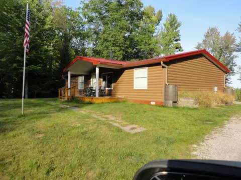 Exterior - 3200 Cedar Shores Dr, Harrison, MI 48625 photo 4 of 25