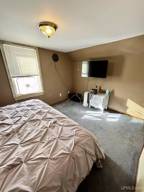 Bedroom - 409 Excelsior, Ishpeming, MI 49849 photo 2 of 3