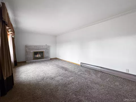 Living - 2122 S 3rd, Escanaba, MI 49829 photo 3 of 4