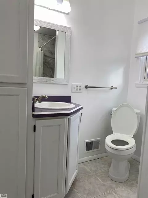 Bath - 203 E Kempf, Capac, MI 48014 photo 1 of 2