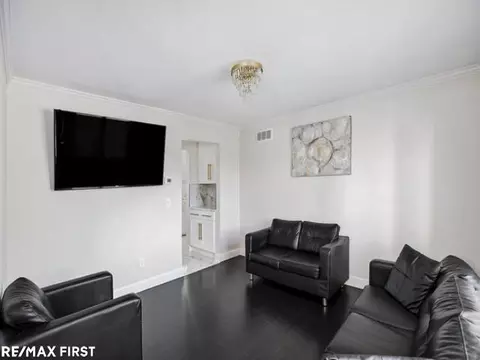 Living - 18765 Riverside Gln, Macomb, MI 48044 photo 1 of 4