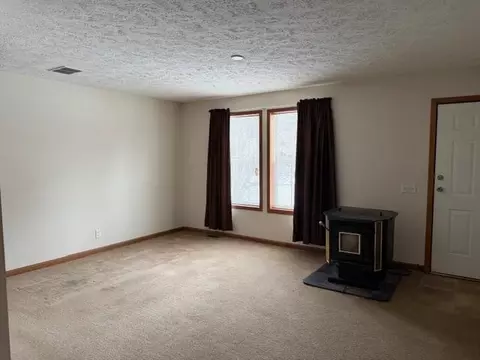 Living - 8100 E Arnold Lk, Harrison, MI 48625 photo 1 of 3