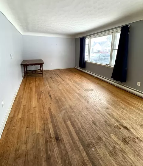 Living - 214 E 6th St, Pinconning, MI 48650 photo 1 of 2