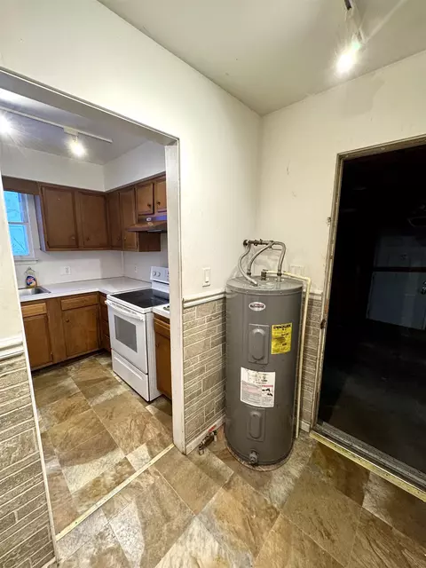 Kitchen - 214 E 6th St, Pinconning, MI 48650 photo 2 of 2