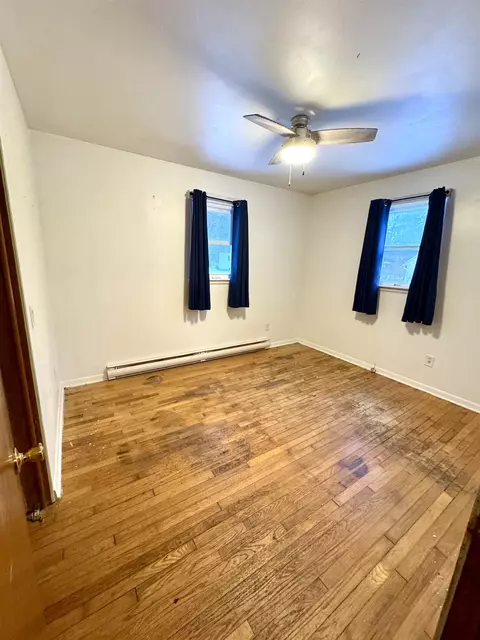 Bedroom - 214 E 6th St, Pinconning, MI 48650 photo 1 of 2