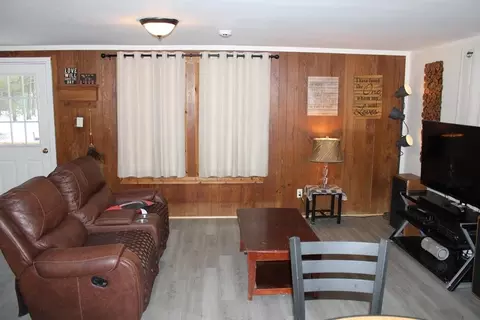 Living - 9545 Hughes, Harrison, MI 48625 photo 1 of 2