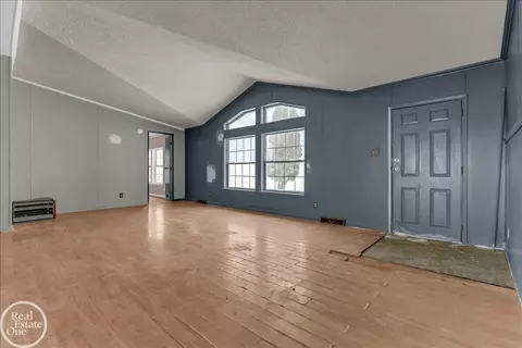 Living - 7677 Hewitt, Greenwood, MI 48006 photo 3 of 5
