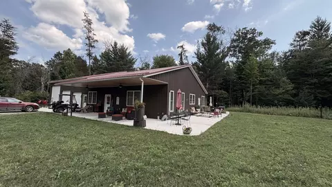 Exterior - 810 E Arnold Lk, Harrison, MI 48625 photo 2 of 7