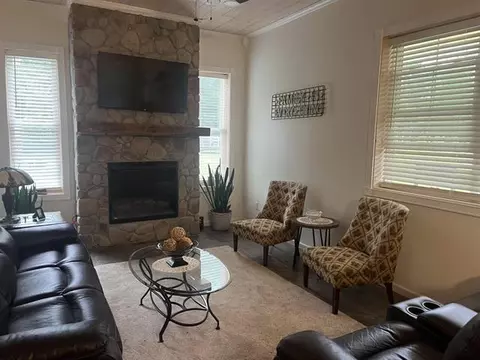 Living - 810 E Arnold Lk, Harrison, MI 48625 photo 1 of 2