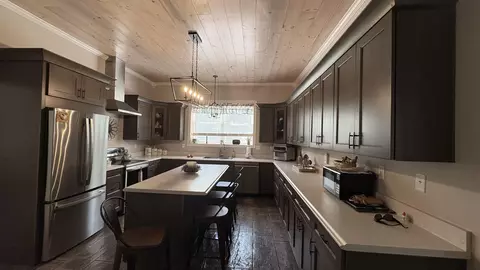 Kitchen - 810 E Arnold Lk, Harrison, MI 48625 photo 5 of 5