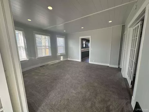 Living - 910 S 13th, Escanaba, MI 49829 photo 3 of 3