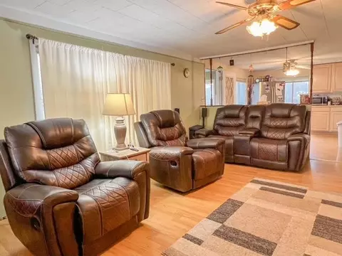 Living - 7020 E Arnold Lk, Harrison, MI 48625 photo 2 of 3