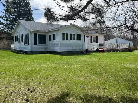 7020 E Arnold Lk, Harrison, MI 48625