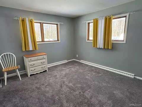 Bedroom - 6841 M75, Escanaba, MI 49829 photo 2 of 3